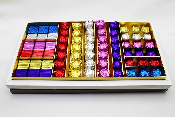 Dark Brown Chocolates & Confections 70 Milk Chocolate Wrapped with Hazelnut Particles